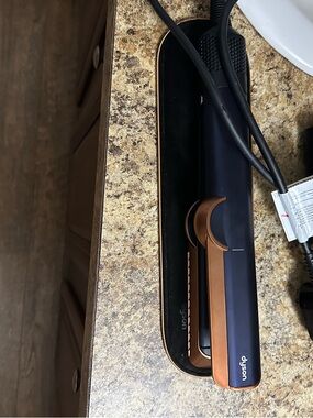 Dyson Airstrait 
Purple and Copper Hair Straightener